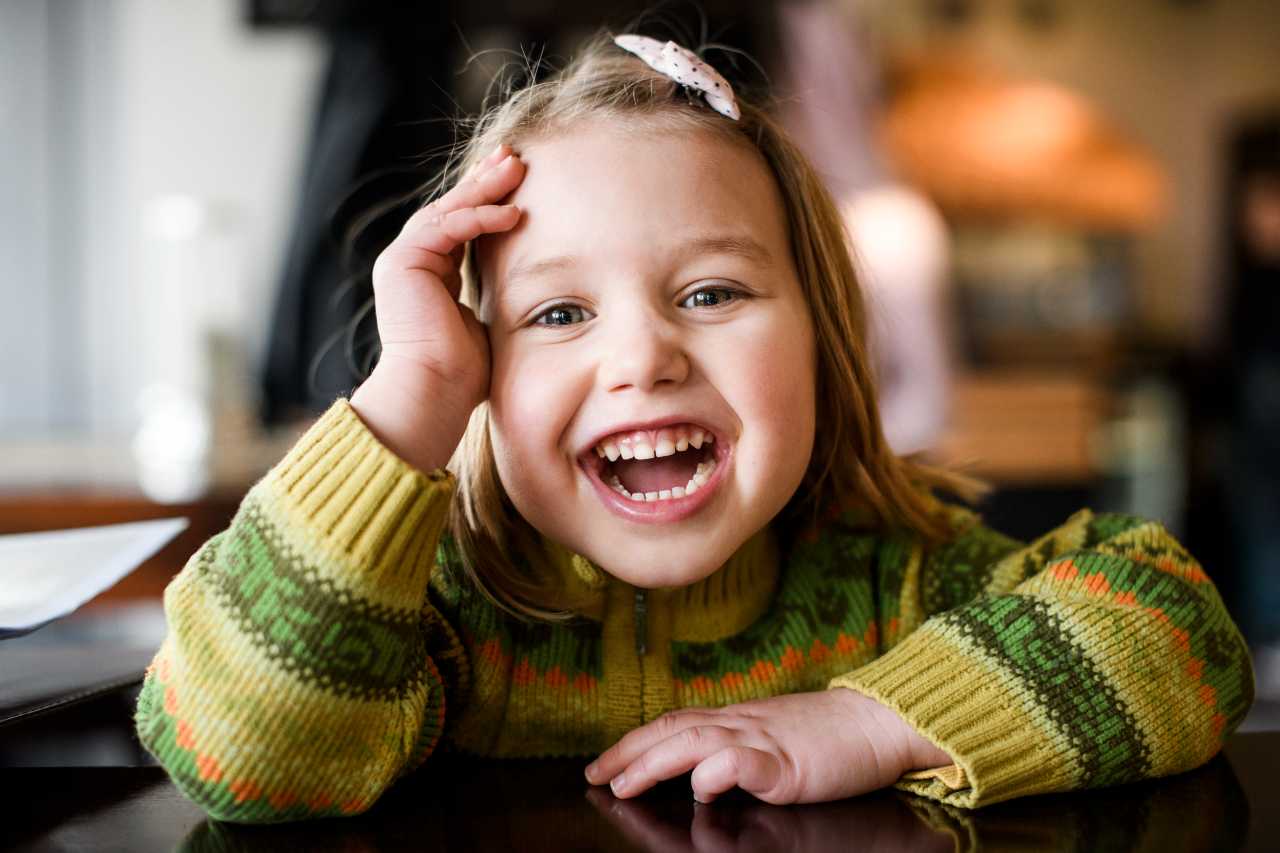 young girl laughing